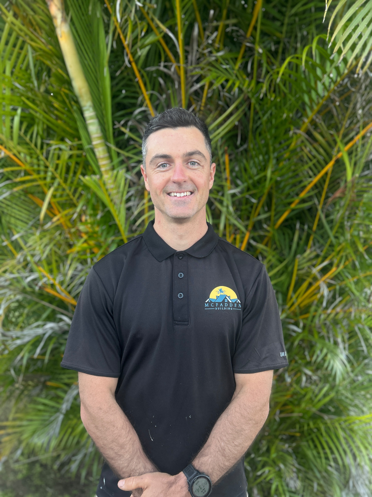 Tom McFadden, builder and owner of McFadden Building, in a branded work polo in the Northern Rivers NSW